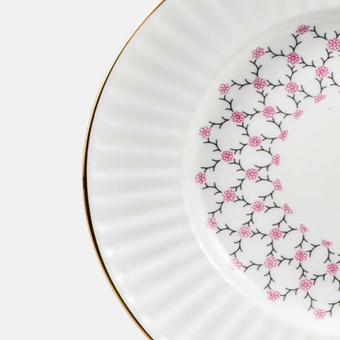 Supplier Pink Net Bone China Wave Plate